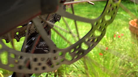 Close-up-shot-of-a-bicycle-disc-brake-spinning-and-stopping