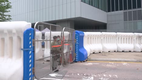 Police-officers-walk-inside-the-vicinity-of-Legislative-Council-building-which-has-been-fortified-with-barricades-in-fears-of-demonstrations-by-anti-government-protesters-in-Hong-Kong
