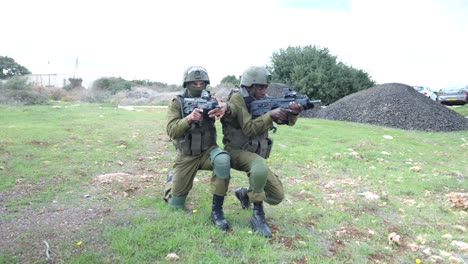 Armed-Golani-Brigade-IDF-soldier-training-holding-rifles-weapons