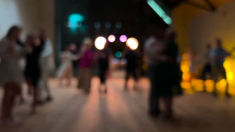 Blurred-image-of-people-dancing-at-a-special-event