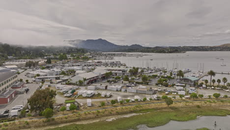 Sausalito-City-California-Aerial-v4-drone-flyover-dunphy-park-capturing-shallow-water-richardson-bay-and-marinas-along-the-shore-on-a-cloudy-and-foggy-day---Shot-with-Mavic-3-Cine---June-2022
