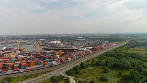 Shipping-sea-containers-in-Klaipeda-harbor,-aerial-drone-view