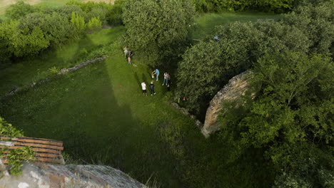 Family-celebrating-in-ruins-of-St