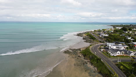 Aerial,-luxurious-houses-exterior-with-sea-view-on-a-cliff-in-Riverton,-New-Zealand