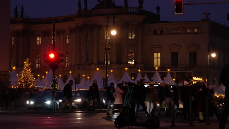 Crowd-of-people-walking-near-Berlin-city-Christmas-town,-static-view