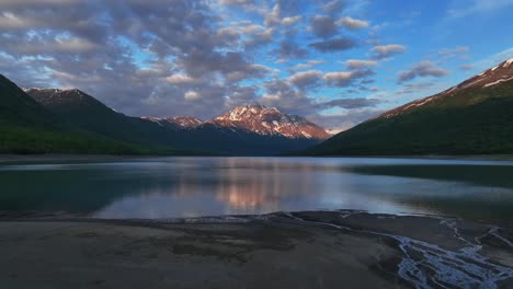 Tranquil-Waters-Of-Eklutna-Lake-In-Alaska---aerial-pullback