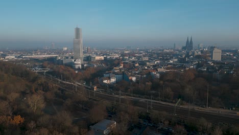 Spectacular-Aerial-View-of-Cologne:-Ascending-Drone-Footage-Showcasing-the-Beauty-of-the-European-City-Köln-in-Germany-with-Mediapark-and-Cathedral-Dom-in-background---Ascending-drone-shot