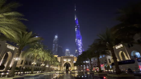 Wide-view-of-Naddaf-Point-view-in-Dubai-City-at-night-with-a-light-show-on-Burj-Khalifa,-a-famous-place-for-taking-pictures-for-social-media