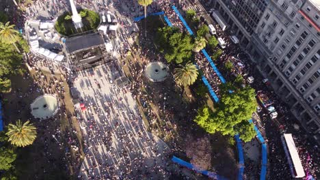 Aerial-top-down-shot-of-people-on-Plaza-de-Mayo-celebrating-Lesbian,-Gay,-Bisexual-and-Transgender-Event-in-Buenos-Aires