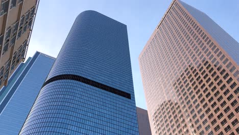 Looking-up-at-modern-skyscrapers-in-downtown-Los-Angeles---panorama