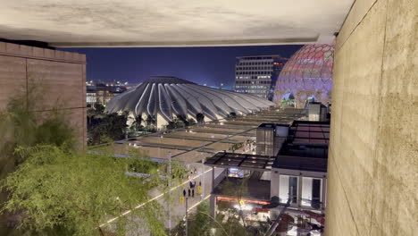 UAE-Pavilion,-Al-Wasl-Plaza-and-Staff-buildings-seen-from-the-Morocco-pavilion-garden-at-night