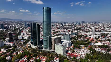 Torre-Mitikah-gebäude-Und-Das-Stadtbild-Der-Sonnigen-Mexiko-stadt---Luftbild