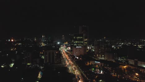 Victoria-Island,-Lagos-Nigeria--December-20-2022:-Cityscape-of-Victoria-Island-at-Night-time-with-traffic,-a-luxurious-business-and-residential-district-in-Lagos