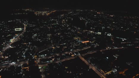 Victoria-Island,-Lagos-Nigeria--December-20-2022:-Cityscape-of-Victoria-Island-at-Night-time-with-traffic,-a-luxurious-business-and-residential-district-in-Lagos