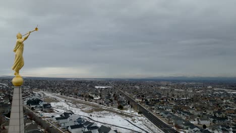 Close-aerial-view-of-Angel-Moroni-on-the-LDS-Oquirrh-Mountain-Temple---reveal-the-location