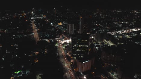 Victoria-Island,-Lagos-Nigeria--December-20-2022:-Cityscape-of-Victoria-Island-at-Night-time-with-traffic,-a-luxurious-business-and-residential-district-in-Lagos