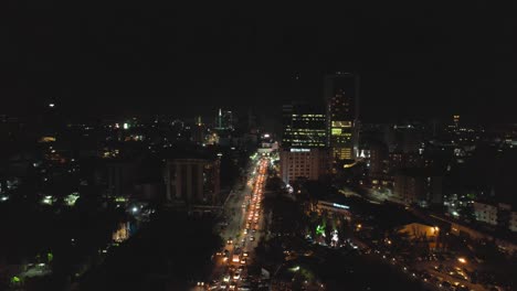 Victoria-Island,-Lagos-Nigeria--December-20-2022:-Cityscape-of-Victoria-Island-at-Night-time-with-traffic,-a-luxurious-business-and-residential-district-in-Lagos