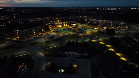Wide-aerial-establishing-shot-of-large-retirement-community-and-home-in-America-at-night