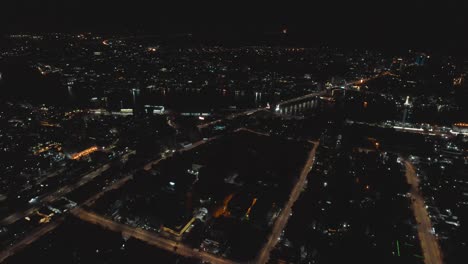 Victoria-Island,-Lagos-Nigeria--December-20-2022:-Cityscape-of-Victoria-Island-at-Night-time-with-traffic,-a-luxurious-business-and-residential-district-in-Lagos