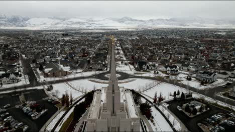 Pull-back-aerial-reveal-of-the-LDS-Oquirrh-Mountain-Temple---Angel-Moroni