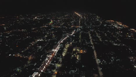 Victoria-Island,-Lagos-Nigeria--December-20-2022:-Cityscape-of-Victoria-Island-at-Night-time-with-traffic,-a-luxurious-business-and-residential-district-in-Lagos