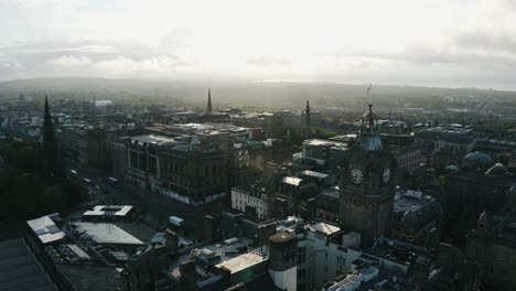 Aerial-view-of-Edinburgh's-downtown-district-with-the-Balmoral-clock-tower-prominently-featured