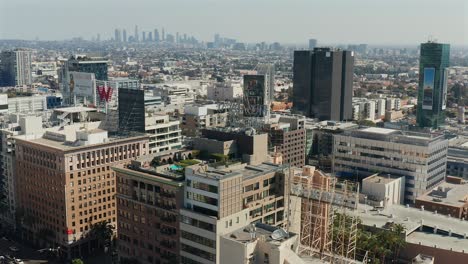 Sliding-aerial-view-over-Hollywood-California-and-Downtown-Los-Angeles