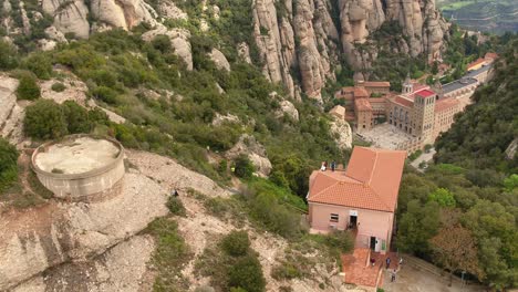 Tourist-Destination-Montserrat-Monastery-or-Santa-Maria-de-Montserrat-Abbey,-Landmark-of-Spain,-Aerial