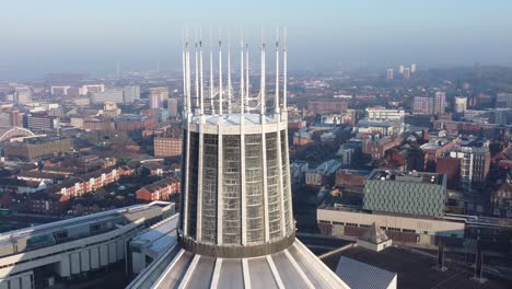 Liverpool-Metropolitan-cathedral-contemporary-city-famous-rooftop-spires-aerial-push-in-right