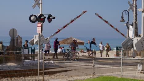 People-crossing-train-tracks-after-a-train-has-moved-through