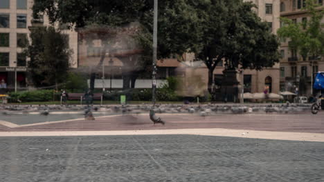 Fast-speeding-city-life-timelapse-energy-across-Plaza-Catalunya-Barcelona-Spain