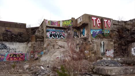 Graffiti-And-Street-Art-On-Walls-Of-Abandoned-Building,-Urban-Architecture-Ruins