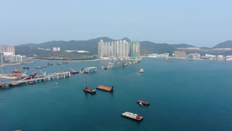 Proyecto-De-Construcción-Del-Enlace-Cruzado-De-La-Bahía-De-Hong-Kong,-Un-Puente-Doble-De-Dos-Carriles-Que-Conecta-El-Túnel-Tseung-Kwan-O-Lam-Tin-Con-La-Carretera-Wan-Po,-Vista-Aérea