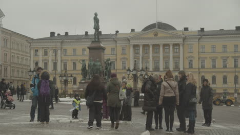 Crowd-of-people-are-preparing-for-a-protest-next-to-the-statue-of-Emperor-Alexander-II