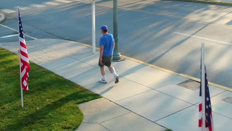 Old-man-walking-on-the-Lititz-streets-alone-on-4th-July-during-a-covid-outbreak