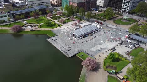 Covid-19-Testing-station-in-Bergen-Norway---Aerial-overview-of-festplassen-with-people-waiting-in-line-to-get-tested