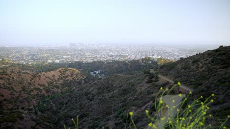 Panoramic-view-of-Los-Angeles-downtown-and-the-Griffith-Observatory-from-the-hills