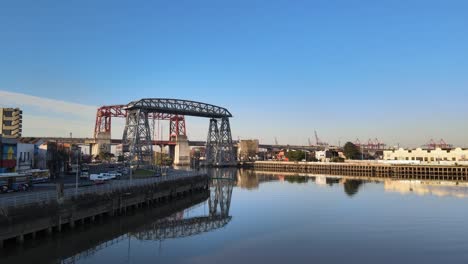 Aerial-pan-of-famous-bridges-and-traffic-by-shore-in-Buenos-Aires