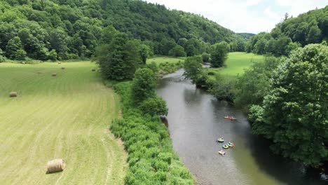 Tubes-and-Kayaks-on-the-New-River-in-Watauga-County-NC,-North-Carolina-near-Boone-and-Blowing-Rock