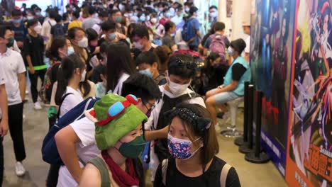 Visitors-queue-in-line-to-have-access-to-a-booth-during-the-Anicom-and-Games-ACGHK-exhibition-event-in-Hong-Kong