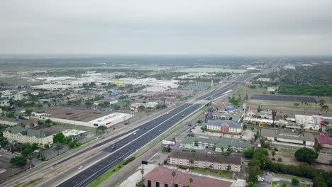 McAllen-Texas-downtown-one-week-after-covid19-national-shutdown,-footage-over-expressway-83