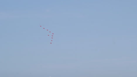 Royal-air-force-aerobatic-display-team-in-formation-flying-in-distance