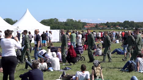 Polish-army-soldiers-walking-among-crowd-on-aerobatic-show