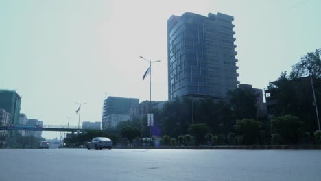 Man-With-Donkey-Cart-Going-Past-On-Shahrah-E-Faisal-Road-In-Karachi