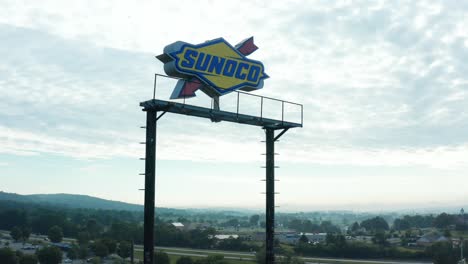 Sunoco-sign-against-sky