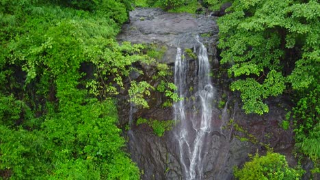 Drone-Shot-of-Beautiful-Waterfall-on-the-hill