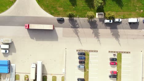 Aerial-view-of-logistics-center,-warehouses-near-the-highway