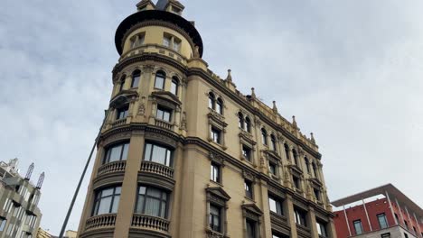 Walk-through-the-center-of-Barcelona-with-a-gimbal-walking-forward-along-the-pedestrian-path