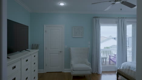 Track-forward-into-cozy-modern-bedroom-gimbal-shot-4k