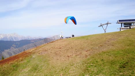 Paragliders-Flying-Over-The-Schmittenhohe-Mountain-In-Salzburg,-Austria